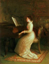Dam vid pianot